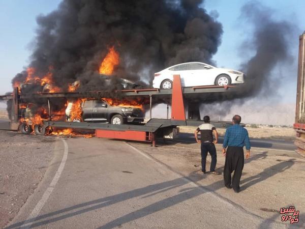 آتش گرفتن تریلی حمل خودروهای وارداتی در بندر عباس + فیلم و عکس